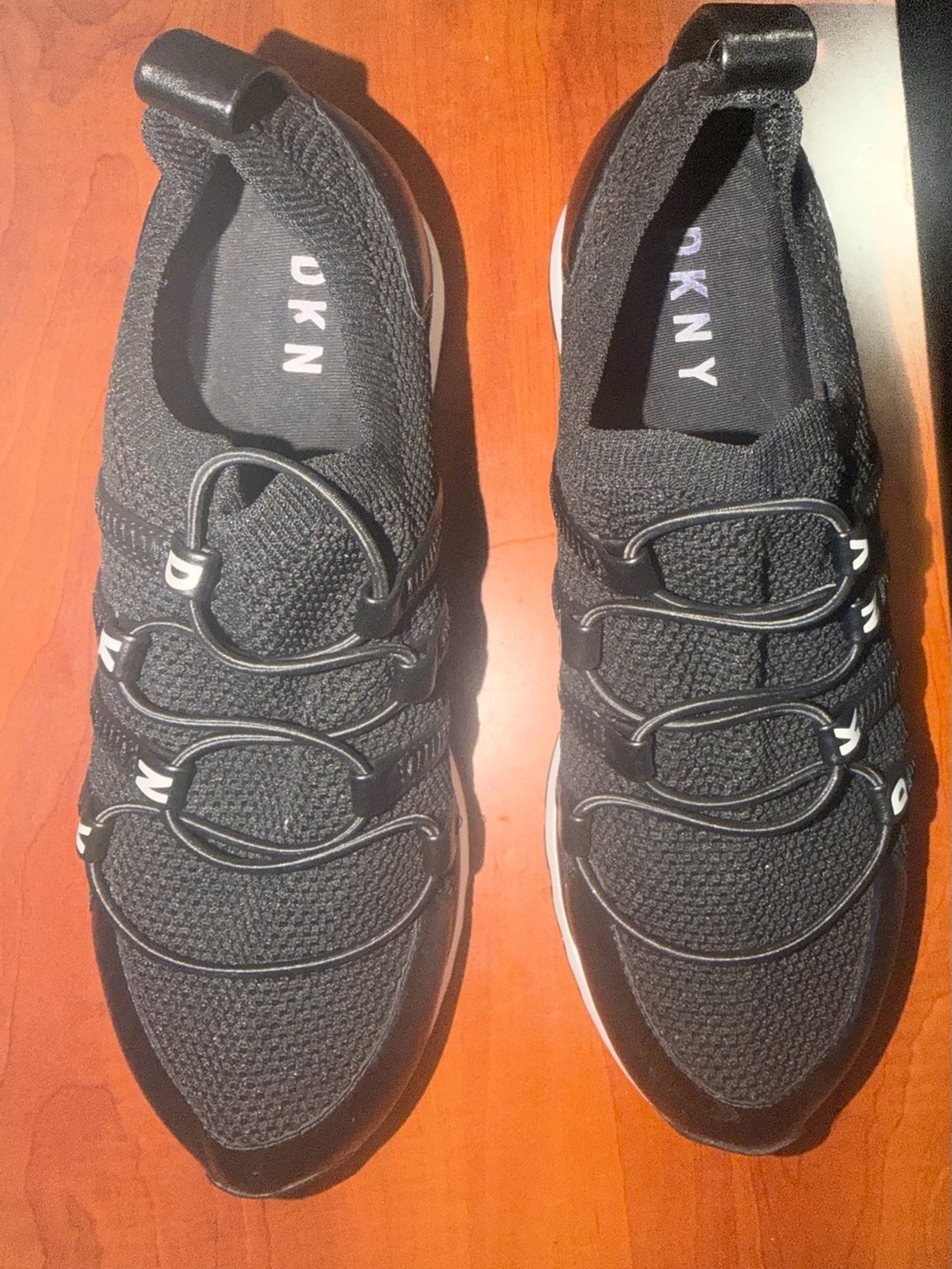 DKNY Black Knit Slip-On Sneakers with White Trim